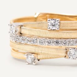 Anello a cinque fili con castoni e barretta di diamanti in oro giallo_00002